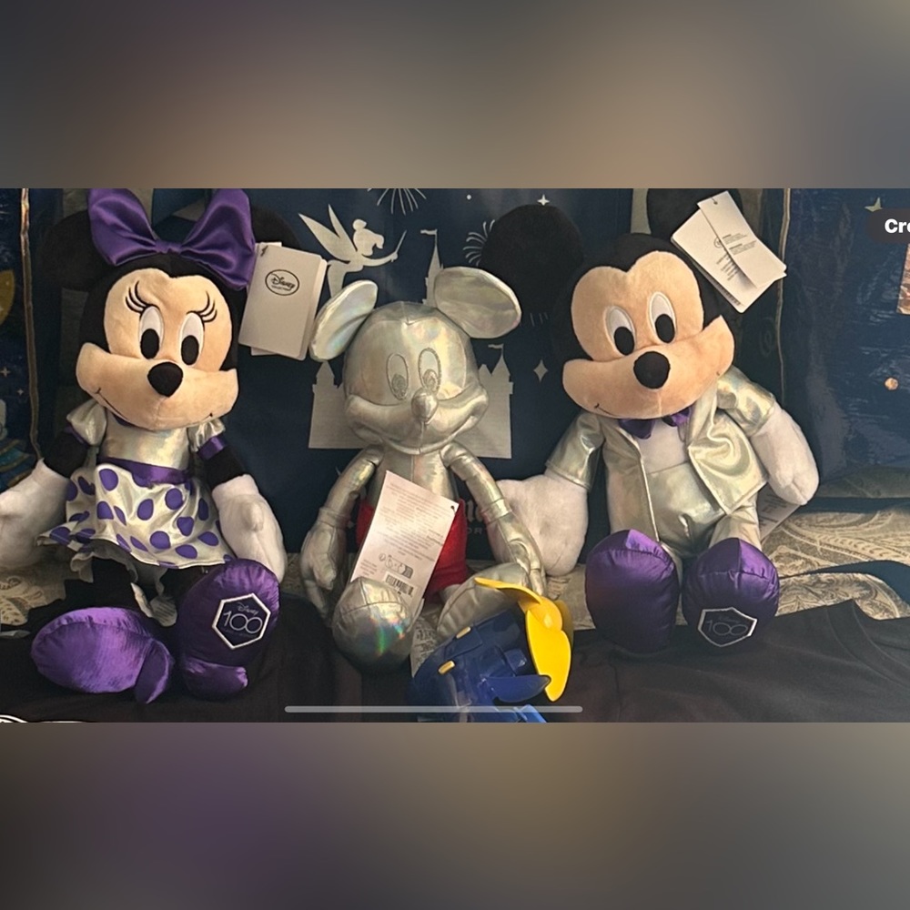 3 Disney plush 100 anniversary edition. Two Mickey one Minnie. All new with tag